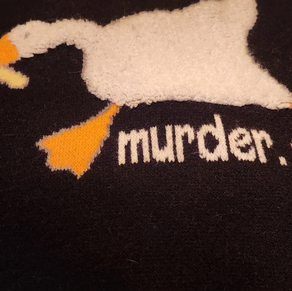This is an Aelfric Eden Murder Goose Graphic Knit Sweater. Aelfric Eden Murder - Picture 2 of 2
